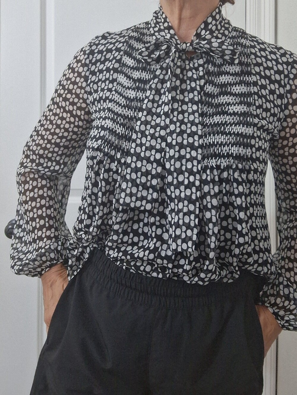 Diane Von Furstenberg Black and White Polka Dot Tie-Neck Blouse.